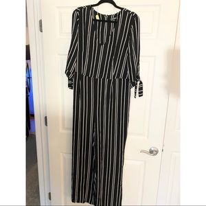 Black and white striped long-sleeve jumpsuit
